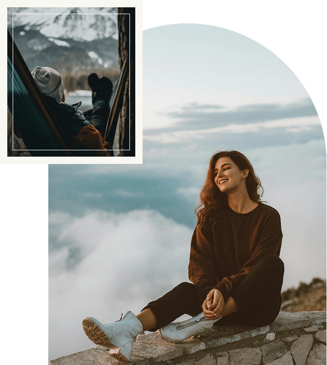 Woman sitting on mountain peak feeling accomplished after completing ERP therapy with Atlanta OCD therapists DeKalb County