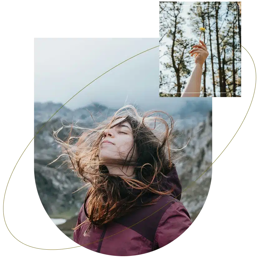 Woman with flowing hair standing before a mountain landscape, reflecting calm and relief after Anxiety Therapy in Atlanta, GA