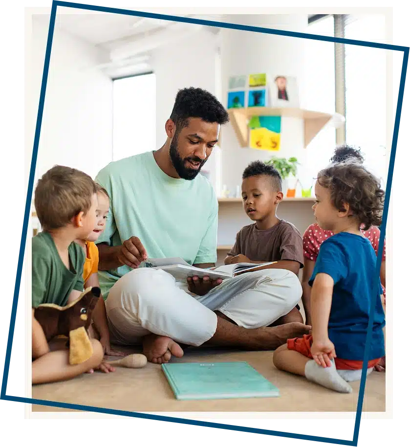 Teacher reading to children.