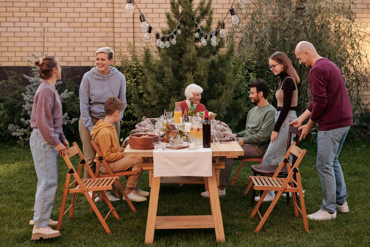 Family sitting around a dinner table during a tense moment illustrating common family arguments and conflict within family dynamics.