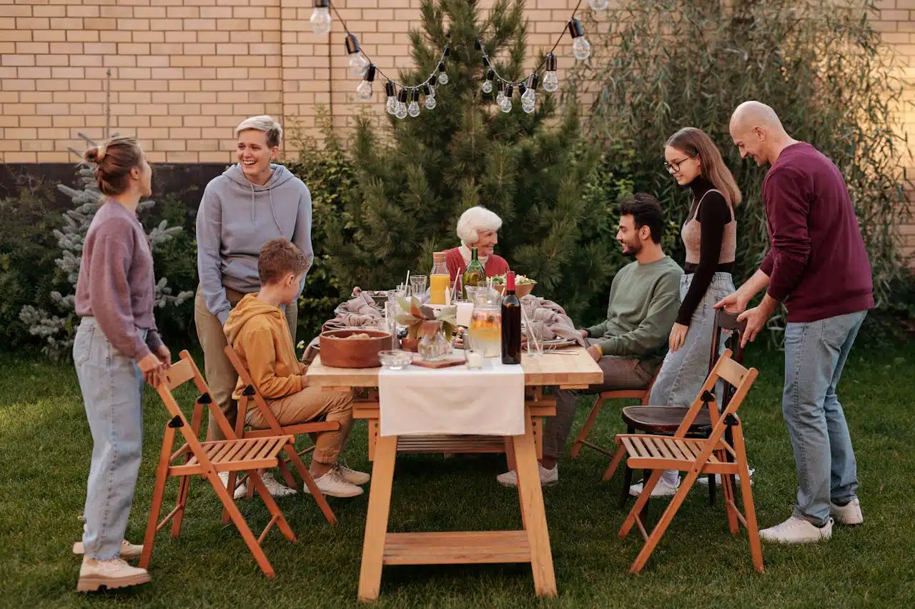 Family sitting around a dinner table during a tense moment illustrating common family arguments and conflict within family dynamics.