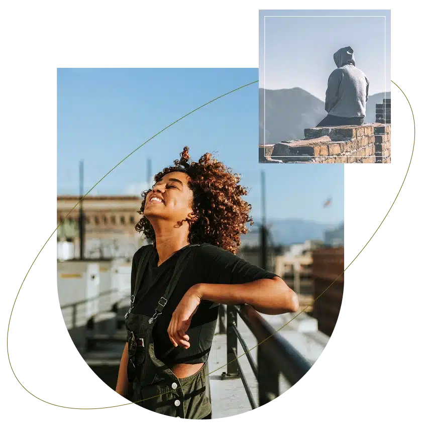 A woman smiling in sunlight, feeling steady with support from trauma therapists in Atlanta, Georgia