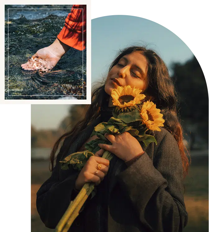 A girl holding sunflowers with sunlight on her face, symbolizing joy, warmth, and emotional brightness.