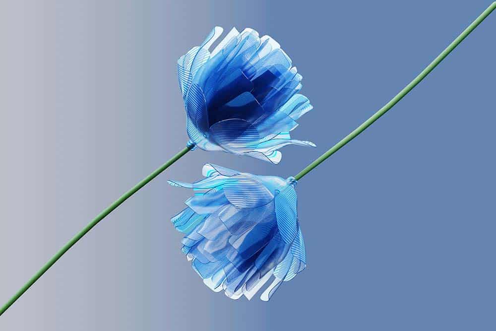 blue flower on a stem against a blue sky